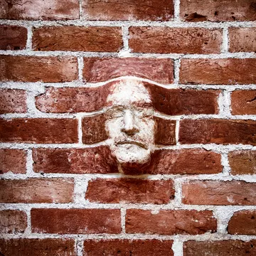 Face in the wall